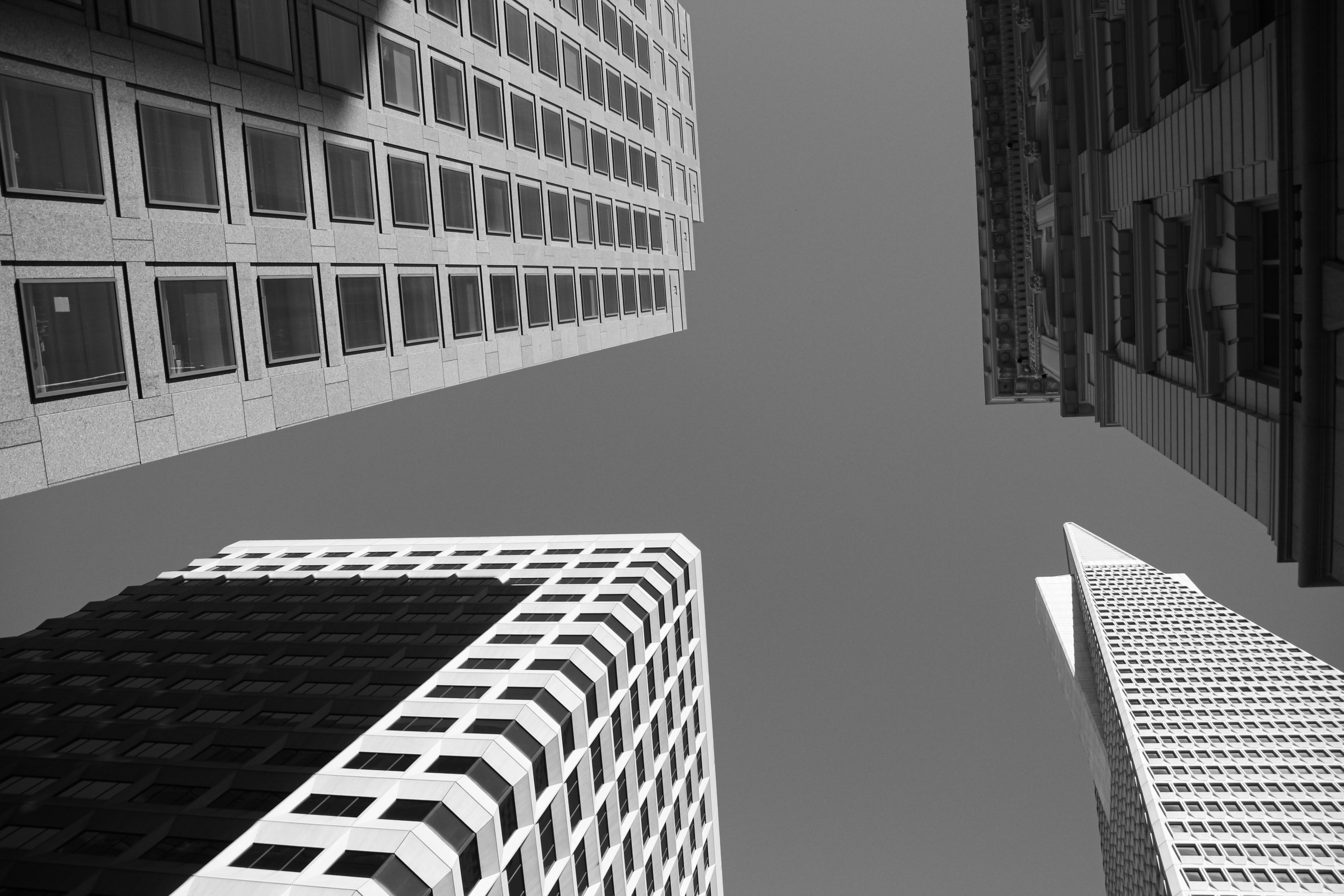 Black and white photo of 4 skyscrapers